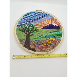 Hand Embordered 9.5" hoop Art, Mountain, Tree, and Flowers landscape.